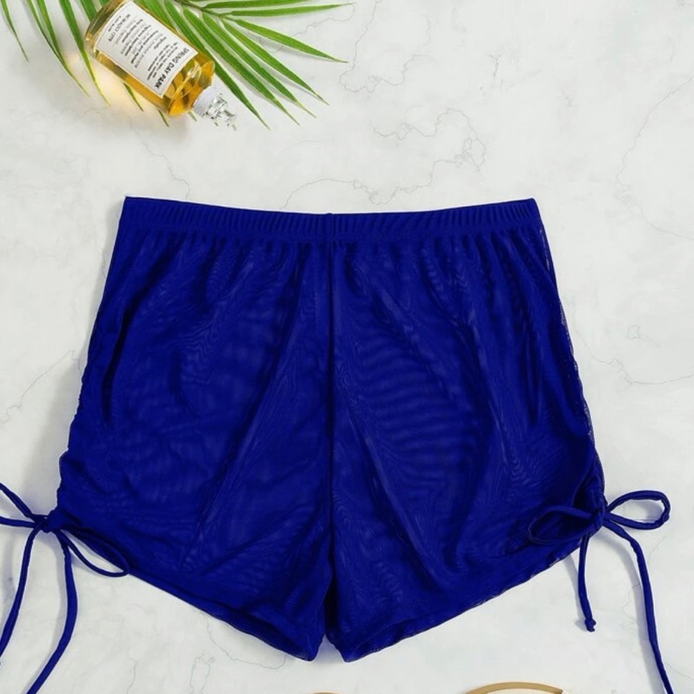 Brand new blue mesh shorts. Ordered two